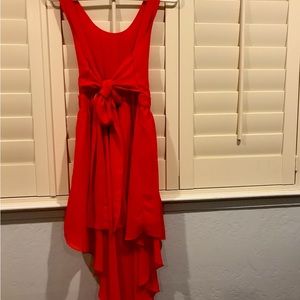 A nice flowy red backless dress.
